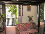 View in living room towards balcony